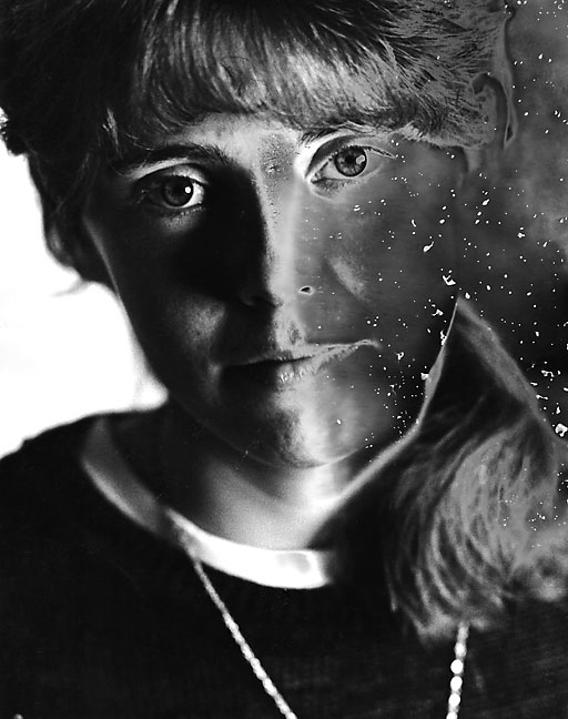 Another one-of-a-kind image: the portrait of Deb Stinson developed in Dektol and darkroom trash.