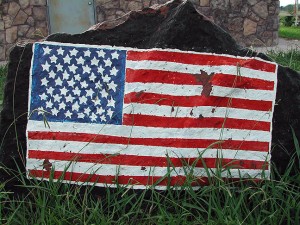 Abby's image of a U. S. flag painted on a boulder at Veteran's Park in Coalgate, Oklahoma, August 2003.