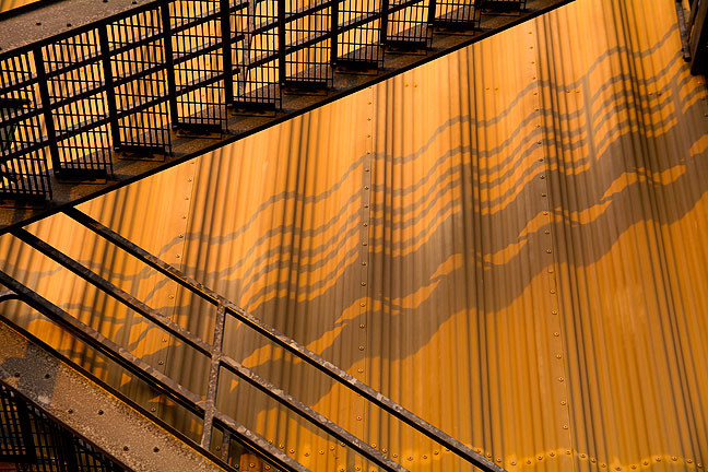 Sunset light cast these lines of shadow on a wall of the fire training tower.