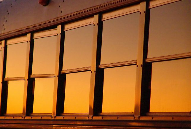 In addition to the sun and sky, objects around us take on very different, and often beautiful, appearances at sunset, like the windows of this bus in Latta, Oklahoma.