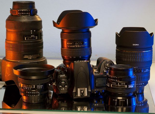 These are some of the wide angle lenses my office and I own that will see the light of day more now that I have a 36x24mm sensor. From left to right are the AF-S Nikkor 28-70mm f/2.8, the AF Nikkor 20mm, the AF Nikkor 18-35mm f/3.5-4.5, the AF Nikkor 28mm f/2.8, and the Sigma AF 15-30mm f/3.5-4.5.