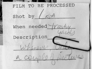 When a reporter shot some film, he or she would attach this little slip of paper to it, which I would paperclip to the print.
