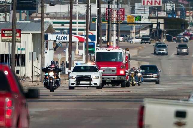 I shot this police and fire escorted motorcycle toy drive yesterday with the Opteka 500mm, and while it wasn't nearly as sharp as, say, my 300mm f/4, it was quite workable.