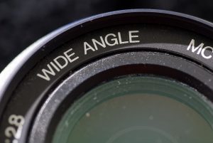 A wide angle lens on your wish list might be a solution in search of a problem if you imagine it will change how you compose photographs. Instead of a lens, consider movement and light.