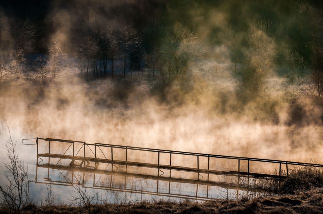 Steam billows over a farm pond between Byng and Ada, Oklahoma Saturday morning, March 16; shot with the Nikon D300S and the AF-S Nikkor 80-200mm f/2.8.