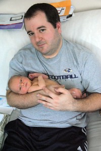 Tom Reeves with his new son, Abby's grandson Paul Thomas Reeves, last week.