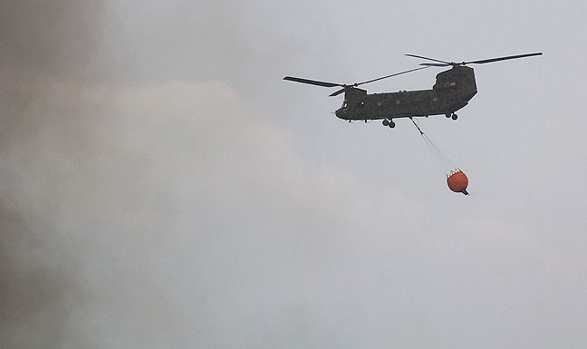 This Chinook helicopter was summoned from Oklahoma City to fight the Happyland fire, only to be diverted to the Byng fire.