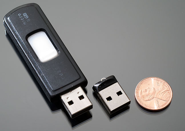 For comparison, here is an 8GB jump drive, the tiny 32GB jump drive, and a penny. Yes, the 32GB is so small it might be easy to lose, but I intend to keep it in the USB port in my car.