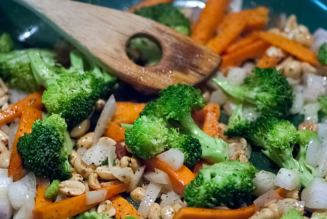 Dinner tonight was my top go-to vegan entrée, broccoli stir-fry with carrots, onions, and dry roasted peanuts, seasoned with fresh ground black pepper and just a splash of Pearl River Bridge soy sauce.