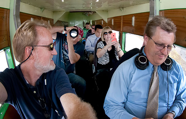 In the front two rows of the Tri-Motor with me (left) are Explore Ada videographer Will Boggs, City of Ada spokesperson Lisa Bratcher, and KCNP radio journalist Brian Brasier, all longtime friends.