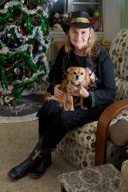 Abby has been cultivating a new look this fall, and felt it all came together just right Tuesday night, so she asked me to make this image of her with Sierra the Chihuahua in front of our Christmas tree.