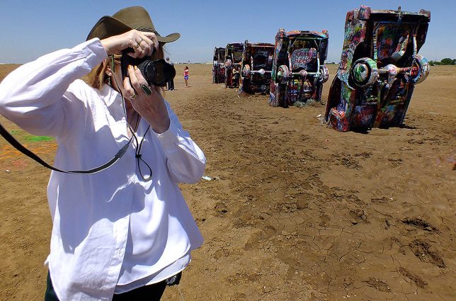 Abby makes pictures at Amarillo's famous Cadillac Ranch on our June vacation.
