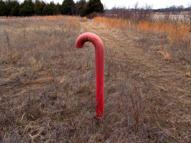 There's always something to discover when you walk, from pennies on the sidewalk to these standpipes that resemble candy canes. In a car, it all flies past the window, unnoticed.