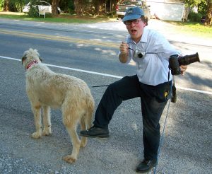 Robert gets tangles in a web of leashes and camera straps as we walk Hawken the Irish Wolfhound.
