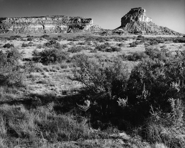 Fajada Butte is the most recognizable natural feature at Chaco Canyon. To its left is Chacra Mesa.