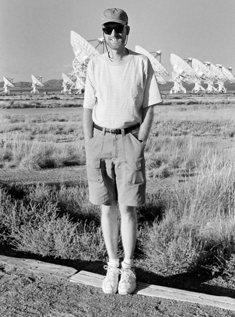 The author smiles at the Very Large Array near Magdalena, New Mexico.