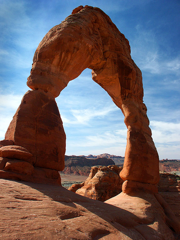 Mid-morning light shines on Delicate Arch in Arches National Park.