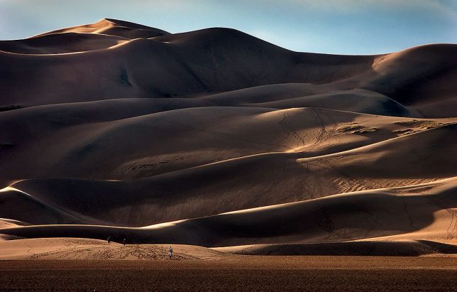 This is one of my favorite images of Great Sand Dunes due to the presence of people and tracks showing how huge the dune field is.