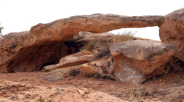 This small natural arch is near the trail head on the Slickrock Foot Trail at Canyonlands. When I tried to look it up, I found it to be poorly-documented, and this photo was among the first on sites documenting natural arches.