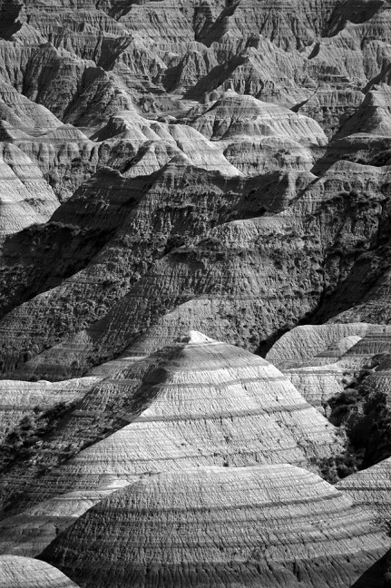 This telephoto view of Badlands National Park shows the depth of the erosions from which the park gets its name.