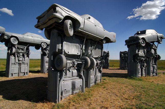 Painting the cars grey at Carhenge makes for a very different look that the colorful graffiti of an attraction like the Cadillac Ranch.