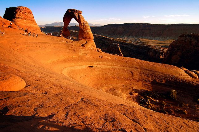 Delicate Arch, where our marriage began a year earlier, shines in evening light.