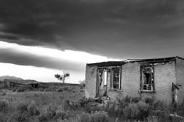 Abandoned house and clouds near Yellow Jacket, Colorado.