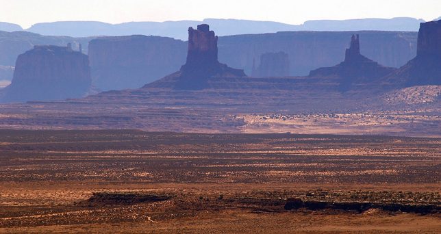 This longer telephoto view from Muley Point shows more of the features of Monument Valley, which we visited the next day.