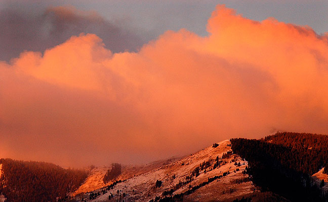 Light from sunrise casts a seep orange glow over the snow-capped Abajo Mountains in Monticello, Utah as we prepared for the long drive home to Oklahoma.