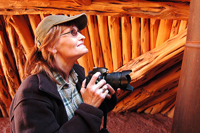 Abby photographs a hogan at the Monument Valley Tribal Park.