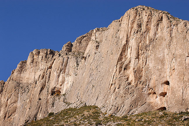 An imposing sheer cliff face greets visitors on the Permian Reef trail.