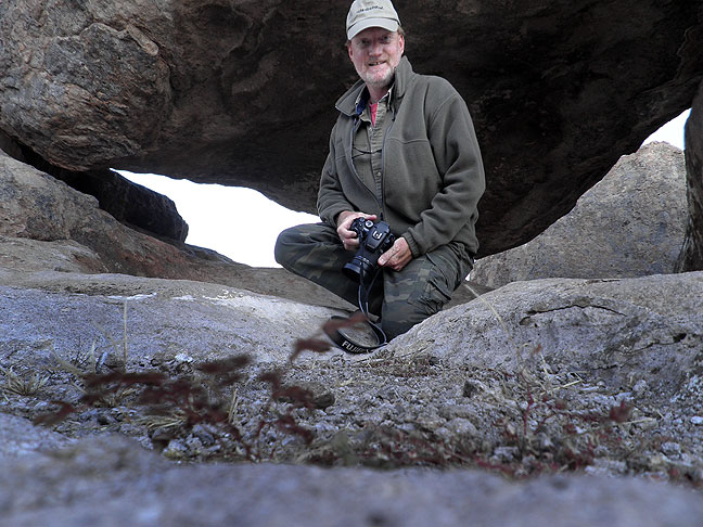 Posing under a shelf of rock at City of Rocks, near the end of my adventure there.