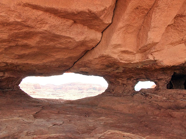 Two small natural arches stand not far from the Peek-a-Boo arch.