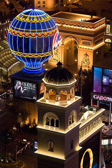 This view from above shows the entrance to The Bellagio as well as the two-thirds size Arc de Triomphe and the Montgolfier balloon at Paris Las Vegas.