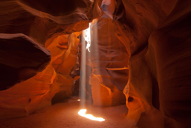 One element that has become ubiquitous in Antelope Canyon photographs in recent years is the "shaft of light," emphasized by the guide throwing sand in the air toward it to make it stand out.