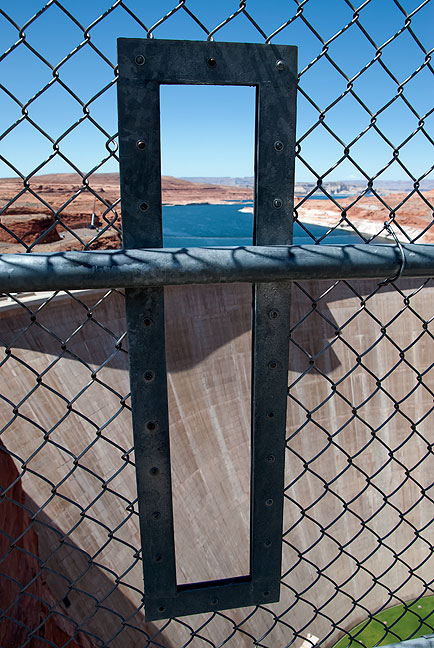 This portal through the fence on the bridge walkway downstream from Glen Canyon Dam is just large enough for a camera or phone. I wonder how many of such devices end up in the river below each year.