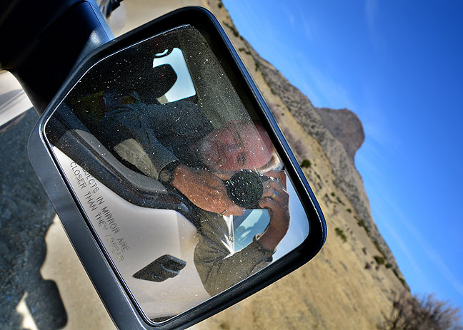 I made this outside-the-box (for me) self portrait in Greg's side mirror near Cabezon Peak.