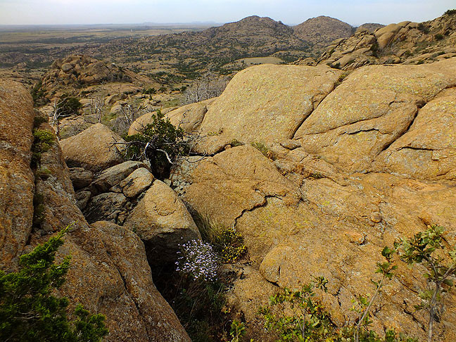 This view looks west from near Sitting Rock toward the Charon's Garden Wilderness.