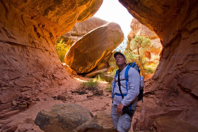 Scott looks up at the center of the Joint Trail's rock formations.