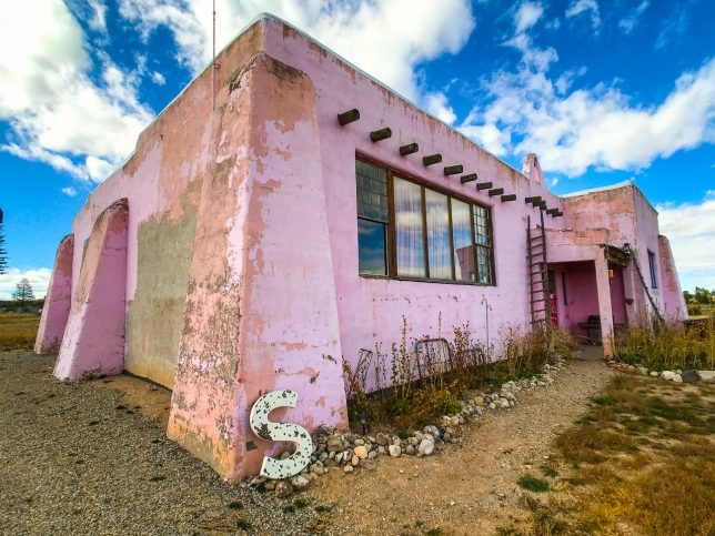 The Old Pink Schoolhouse in Tres Piedras, New Mexico is still old and pink, but on this visit, it appeared to be unoccupied.