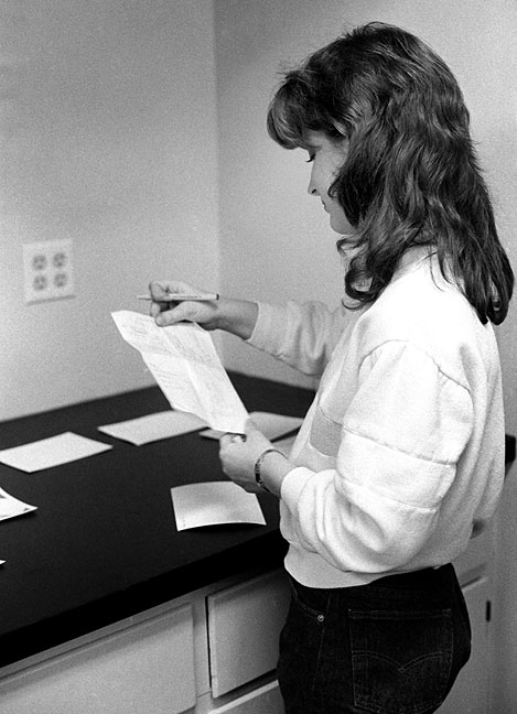 A young journalism student named Darlene works on an assignment in the darkroom at Copeland Hall. She had penetratingly dark, beautiful eyes, and came to my house to let me photograph her.