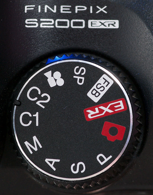 This S200EXR has a fully-functioning PASM exposure mode dial with two user-programmable user settings, labeled C1 and C2.