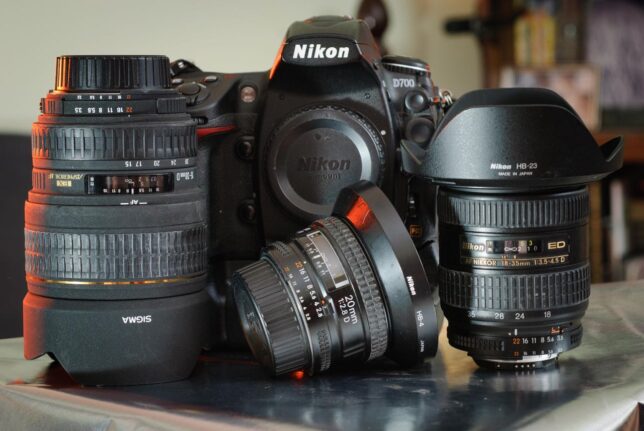 My grungy Nikon D700 is shown with three wide angles that frequently find a home on it: the Sigma 15-30mm, the Nikon 20mm, and the Nikon 18-35mm. All three of these lenses were orphaned until the D700 came along.