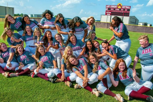 The Ada High Lady Cougar softball team has some fun at my request at last year's fall "media day."