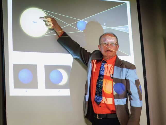 Retired East Central University Physicist Dr. Carl Rutledge discusses the mechanics of solar eclipses Friday, Sept. 22, 2023 at a meeting of Ada Sunrise Rotary at the Aldridge Hotel.