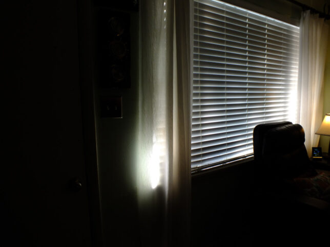 I am so happy with myself when I can make pictures that aren't necessarily for my newspaper, like this morning light streaming in through the front blinds here in my home. 