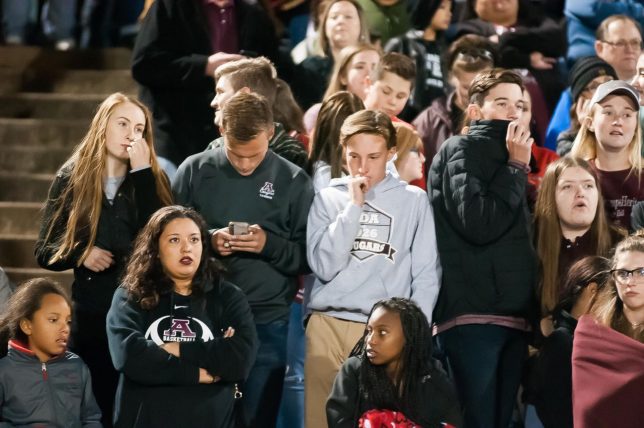 Ada fans look on with dismay in the waning moments of the Ada High vs Heritage Hall Class 4A state championship football game Friday night Choctaw High School. Heritage Hall defeated Ada 14-0 to claim the championship.