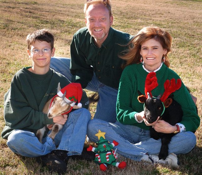 Mitchell, Abby and I pose for a Christmas card with our goats, Coal and Buxton, in December 2004.
