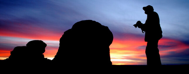 You host is silhouetted against a post-dusk sky in the Windows section at Arches National Park in March 2011. (Photo by Robert Stinson)