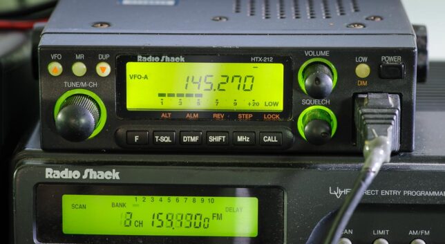 The Radio Shack HTX-212 2-meter mobile radio looks good in my stack with it's green display.